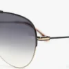 Eleganckie metalowe okulary przeciwsłoneczne typu pilot w kolorze złotym i czarnym Eleganckie metalowe okulary przeciwsłoneczne typu pilot w kolorze złotym i czarnym