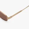Metalowe okulary przeciwsłoneczne w kolorze złoto-miodowym havana Metalowe okulary przeciwsłoneczne w kolorze złoto-miodowym havana