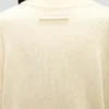 Sweter o luźnym kroju w kolorze kości słoniowej Sweter o luźnym kroju w kolorze kości słoniowej