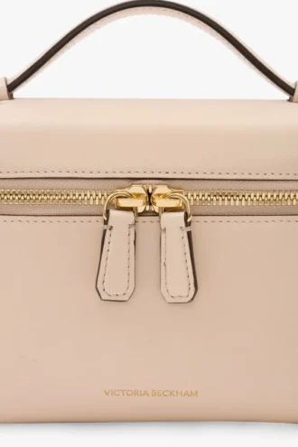 Torebka crossbody Vanity z jasnoróżowej skóry Torebka crossbody Vanity z jasnoróżowej skóry